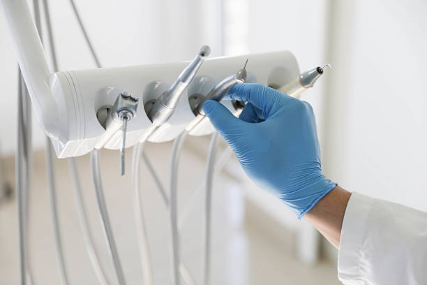 Professional Invisalign Clear Aligners technician working in Cadillac, MI
